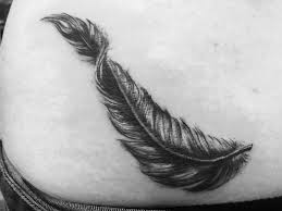 Black And White Feather Tattoo On Lower Back Hip By Jai Gilchrist At Epona Tattoo White Feather Tattoos Tattoos Indian Feather Tattoos