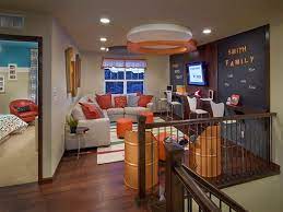 Bright colors, comfy couches, and a large tv can be enjoyed by gamers of all ages. Pin On New House