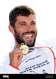 Racice, Czech Republic. 27th Aug, 2017. Winners of the Men K1 200 m, L-R  BENCE HORVATH (Hungary, second place), LIAM HEATH (Britain, first place),  ALEKSEJS RUMJANCEVS (Latvia, third place), celebrate with medals