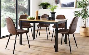 Description:evoking classic elegance, the colin club chair in linen upholstery is a timeless design that complements traditional and transitional furnishings. Milton Painted Black And Oak Dining Table With 4 Brooklyn Vintage Brown Leather Chairs Black Legs Furniture And Choice