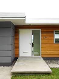 Contemporary and modern architecture have distinctive styles that always turn heads, no matter where they're located. Revamping Vancouver S Hillside Bungalows House Cladding House Exterior Exterior House Colors