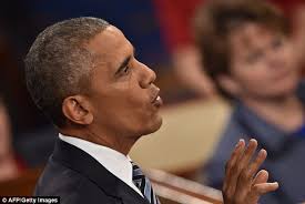 Michelle Obama wears yellow at Barack's final State of the Union address