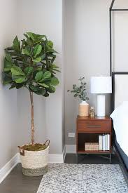 How To Make Your Faux Fiddle Leaf Fig Plant Look Real Diy Playbook Faux Plants Decor Fig Leaf Tree Fake Plants Decor