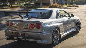Paul walker as agent brian o'conner leans against his 1998 nissan skyline gtr in the newest movie of the fast and the furious franchise. Get A Thorough Tour Of Paul Walker S Nissan Skyline R34 Gt R