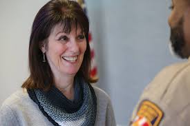 Sheriff Rogers and Sharon Harrison-Pope met the kind hearted Pat Levitin  while she was knitting one of her winter hats that she will be donating to  the homeless of Guilford County. She