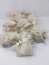 Maybe you would like to learn more about one of these? Bomboniera 50 Di Matrimonio Completa Di Sacchetto Confetti Biglietto E Ciondolo Arte Sacra Candotti