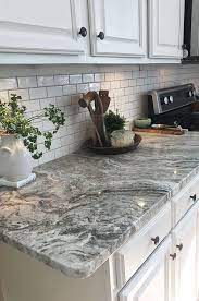 White countertops and gray shaker cabinets. Corian Or Granite 10 Important Differences White Granite Countertops Grey Granite Countertops Grey Countertops