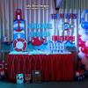 Be sure to hand out sailor hats, yachting caps, cruise ship passes, and retro sunglasses to all of your guests. 3