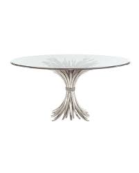 Metal base tables for the dining room and living room introduce an eclectic mix of materials into your design scheme by furnishing your space with a metal base table. Gwinn Glass Metal Wheat Motif Dining Table