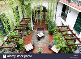 Stock Photo Havana Cuba 27 January 2016 Restaurant On A Patio Of A Colonial House At Old Havana Cuba Caribbean Homes Colonial House Havana