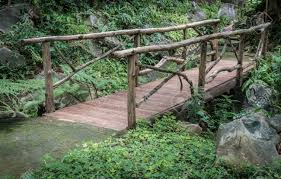 Japanese design and ornamental wooden bridge ideas. Kleine Holzbrucke Im Garten Lizenzfreie Fotos Bilder Und Stock Fotografie Image 61820334