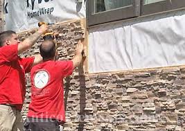 Call our home siding contractors to schedule an installation. Faux Stone Siding Panels 13