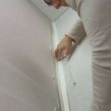 Here, the ceiling sheetrock has been removed. How To Hang Drywall