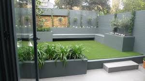 Modern Small Low Maintenance Garden Fake Grass Grey Raised Beds Contemporary Planting Westmins Low Maintenance Garden Design Modern Garden Design Modern Garden