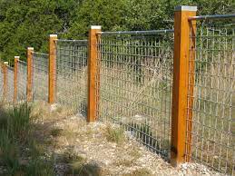 If you choose to use wooden posts for your fence, the first step to building a wire fence for your dog is to dig holes for your corner posts. U Installing Wood And Wire Fence Cost Chain Link Fence With Wood Posts U Post And Rail Welded Wire Styles By Protect Fence Design Wire Fence Panels Cheap Fence