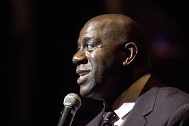 What's Magic Johnson done to help people in Saginaw? A lot, supporters say 