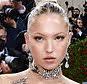 Met Gala 2022: Carey Mulligan dazzles in a luxe gold metal gown with a  sprawling train