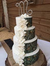 His And Hers Camo And Traditional Wedding Cake Camo Wedding Cakes Country Wedding Cakes Floral Wedding Cakes