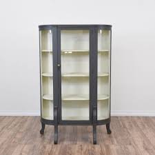 This Curved Curio Cabinet Is Featured In A Solid Wood With A Navy Blue Gray Paint And White Interio Glass Shelves Glass Shelves Decor Glass Shelves In Bathroom
