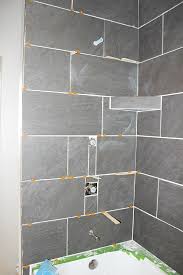 You add tile above and/or around your fibreglass surround. How To Tile A Shower Surround Happihomemade With Sammi Ricke