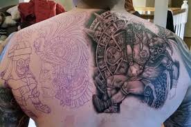 Aztec warrior's face and hieroglyphs done on men's shoulder and upper arm. The 85 Best Aztec Tattoos For Men Improb