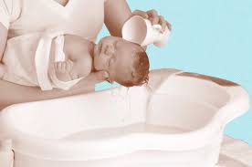 Using the shnuggle, your baby comfortably reclines against the foam back rest. Baby S First Bath How To Bathe A Newborn Parents