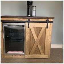 This barn door cabinet holds a mini fridge and microwave! Bigger Mini Size Fridge Farmhouse Style With A Barn Door Slider Cabinet Coffee Station Mini Fridge Bar Coffee Bar Furniture Home Living Truongsinhhoc Com Vn