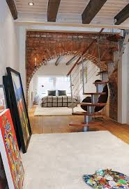 An Artists Abode I Have To Say Though As An Artist I Would Be Hard Pressed To Keep A Space Like This Paint Free Brick Feature Wall Brick Archway House Styles