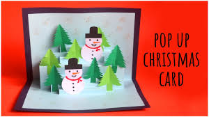 Starting with the 5cm piece (which will be the tree's bottom), glue the last flaps horizontally to the center of the card. How To Make Pop Up Christmas Card Diy Holiday Greetings Card Youtube