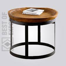 For example, a table with an intricate bronze metal base and geometric glass top will garner more attention than a standard design. Round Coffee Table With Leather Top Best Of Exports