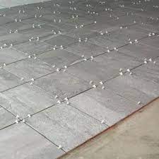 Our New Porcelain Tile Garage Floor Installation Piso De Porcelanato Piso De Garaje Decoracion De Garaje