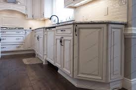 Featuring raised panels and applied moldings these cabinets create an intimate vibe in your living. Wellington Ivory Glaze Luxcraft Cabinets