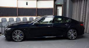 The information you provide to black book, excluding your credit score, will be shared with bmw and a bmw dealership for the purpose of improving your car buying experience. This Bmw M850i Gran Coupe Boasts A Carbon Black Metallic Crust And An Ivory White Filling Carscoops