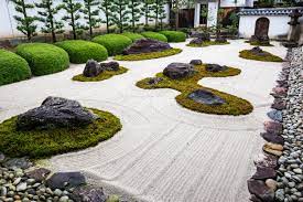 The zen rock garden island stones are carefully placed, and the clean gravel is raked around them in the patterns of waves and currents. 10 Serene Rock Gardens Across The Globe Japanese Rock Garden Zen Rock Garden Japanese Garden Landscape