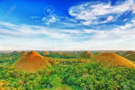 Chocolate hills complex hilly backdrop for the family picture. View Of The Chocolate Hills Bohol Philippines Stock Photo Picture And Royalty Free Image Image 9366031