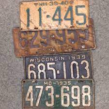 Found These Vintage License Plates At A Flea Market Love This Rusty Gold If You Shop At Antique Vintage License Plates Signage Signs Antique Mall