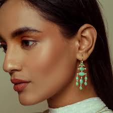 Designed to captivate with its unusual colour & elegant sway, the  chrysoprase and diamond earrings crafted in 18k gold is a fluidic and  expressive piece of jewellery. Shop link  https://www.legendamrapali.com/chrysoprase-and-diamond-earring-in-18kt-gold/
