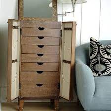 In addition to all of these beautiful styling options you can't forget the functionality our jewelry armoires offer. Birch Lane Maddox Free Standing Jewelry Armoire With Mirror In 2021 Standing Jewelry Armoire Jewelry Armoire Wall Mounted Jewelry Armoire