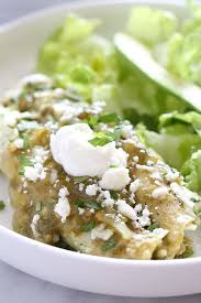 Traditional Mexican Green Chicken Enchiladas Made Lighter Than The Typical Restaurant Dish Served Throughout Skinny Taste Recipes Mexican Food Recipes Recipes