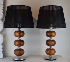 I found two affordable frames and both have a brushed aluminum finish. Henrik Blomqvist Table Lights In Walnut Brushed Aluminum Finish 1960 S 127924