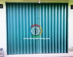 Bagaimana menciptakan perpaduan warna dan motif yang serasi dalam menentukanpintu harmonika?. Jasa Pengecatan Pintu Ruko Folding Gate Ruko Di Malang Kios Advertising Malang