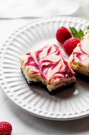 Lemon and raspberry is a classic combination in many summer desserts! White Chocolate Raspberry Cheesecake Bars Sally S Baking Addiction