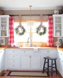 The wintry pine garland features mixed branch the wintry pine garland features mixed branch tips trimmed with red berries, pine cones and snowflakes. 17 Ways To Decorate Inside With Christmas Wreaths Christmas Designers
