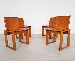 Bring the clean lines and warmth of scandinavian style to the dining room with this contemporary woven leather dining chair. Set Of 4 Cognac Leather Dining Chairs By Afra Tobia Scarpa For Molteni 1970s 98459