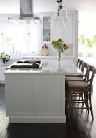 The golden rule for kitchen design is the work triangle, but that doesn't mean you can't add a little stop in it's a great place to store platters and pots, cooking utensils, foil, dish towels and oven mitts. 20 Best Kitchen Island Oven Ideas Kitchen Design Kitchen Island Oven Kitchen Remodel