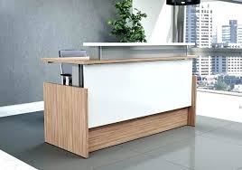 This fashionable reception center in clean contemporary design. Small Reception Table Design For Office Architecture Home Decor