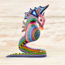Alebrijes are a form of mexican crafts created simply as an artistic object and not for a specific date or event. Seahorse Alebrije Oaxacan Wood Carving Mexican Oaxacanwoodcarving Alebrije Alebrijes Woodcarving Mexican Folk Art South American Art Mexican Art