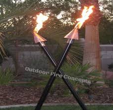 Top hit on tiki torch !!! Outdoor Fire Concepts Automated Tiki Torches Landscape Architect