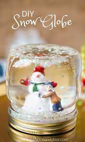 Diy Snow Globes An Easy Winter Craft For Kids Or A Fun Way To Save Travel Memories Or A Custom Diy Sno In 2020 Diy Snow Globe Homemade Snow Globes
