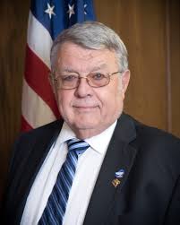 Small protest draws attention as police juror's comments draw ire